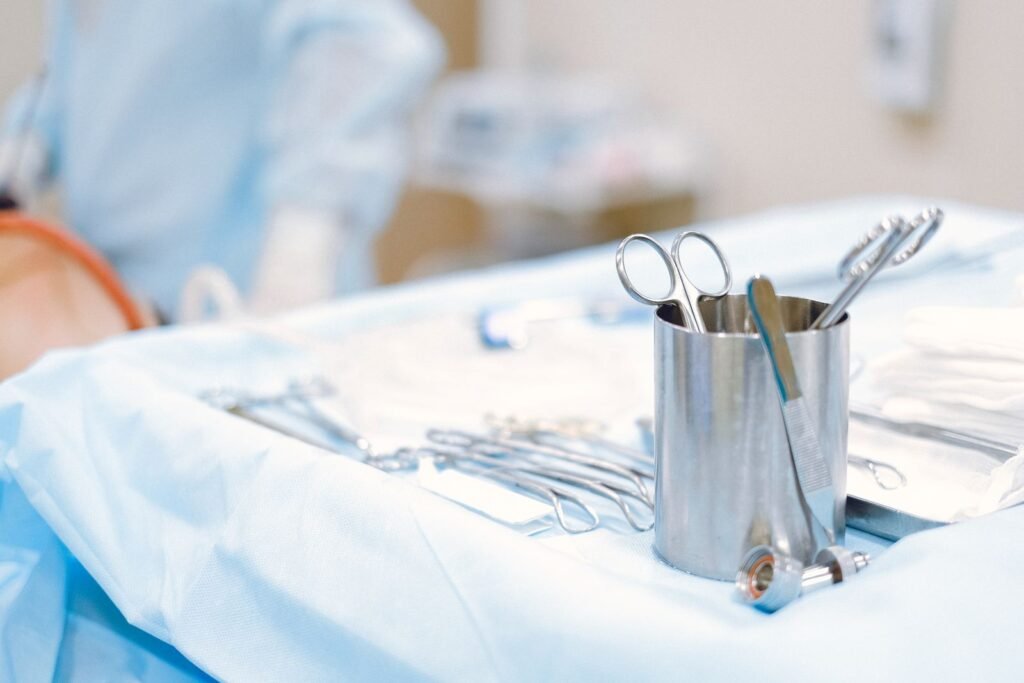 Cartiva revision surgery: surgical instruments laid out on a sterile table in an operating room
