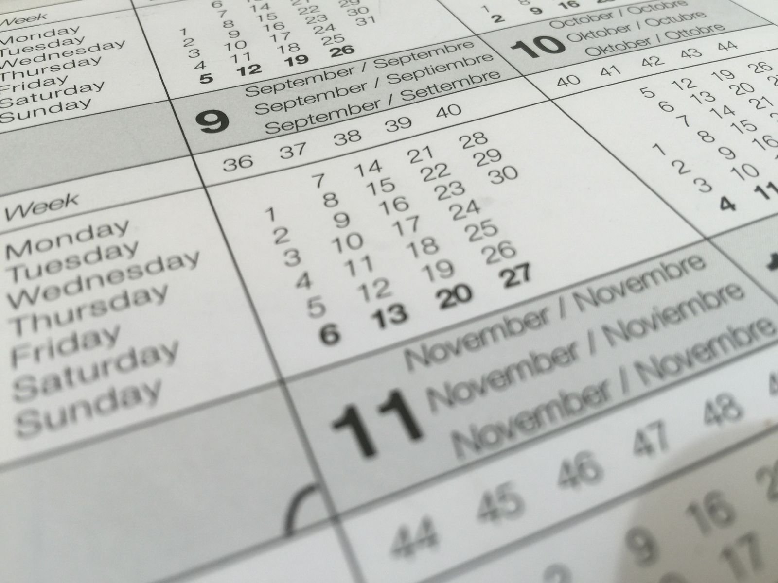 Close-up of a printed calendar page with dates, representing upcoming deadlines
