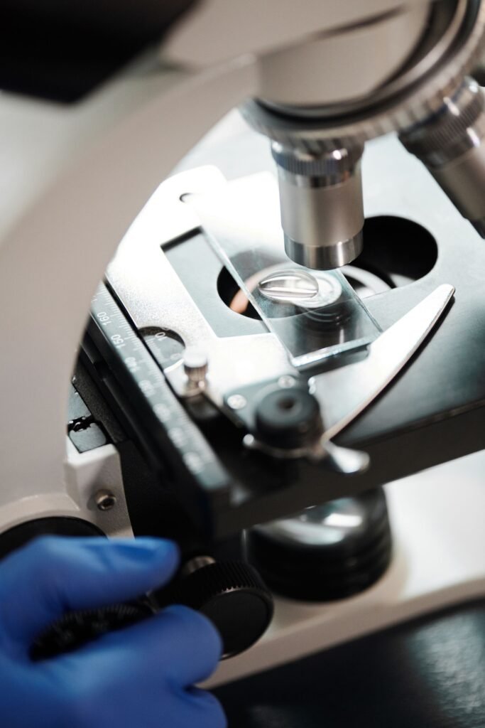 Dupixent lawsuit: close-up of a laboratory microscope examining a slide, representing lymphoma research