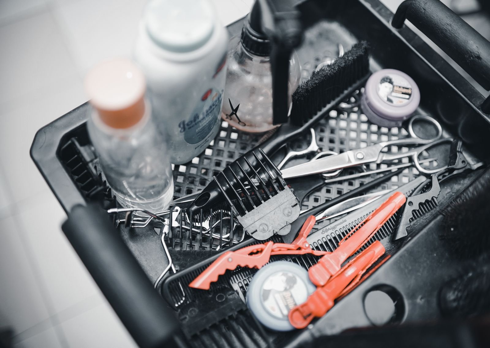 FDA formaldehyde ban: scissors, combs and hairpins arranged on a tray in a hair salon