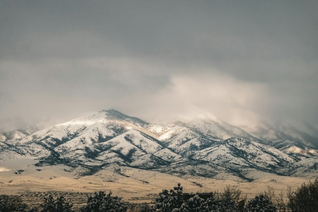 LDS abuse statute of limitations: snow-covered Utah mountain range under a cloudy sky