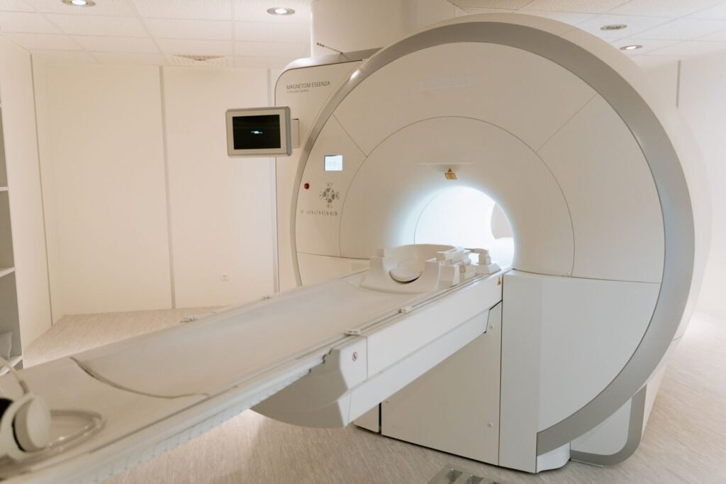 Depo-Provera meningioma symptoms: empty MRI scanner in a bright hospital imaging room