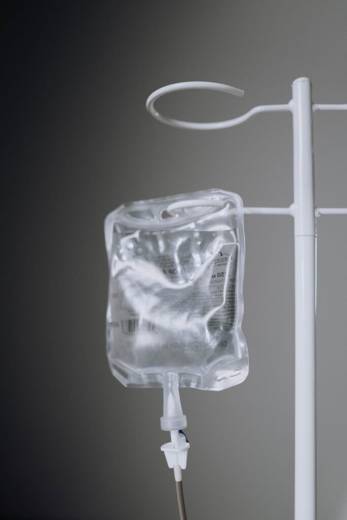 Roundup cancer lawsuit: iV fluid bag hanging on a pole in a treatment room