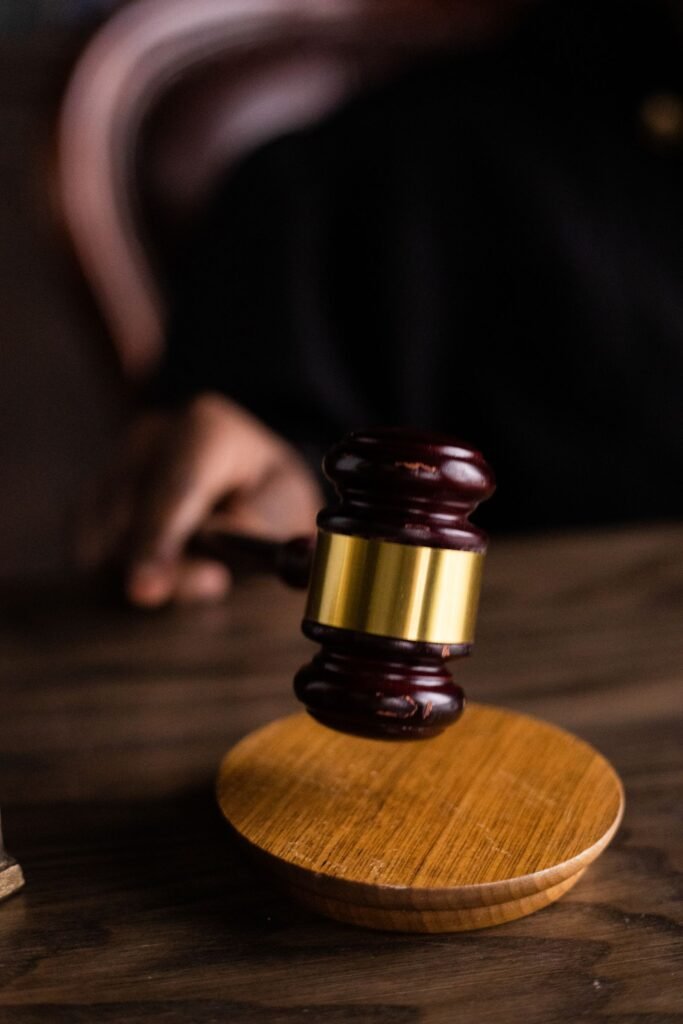 Roundup verdicts: brown and gold gavel resting on a wooden sound block
