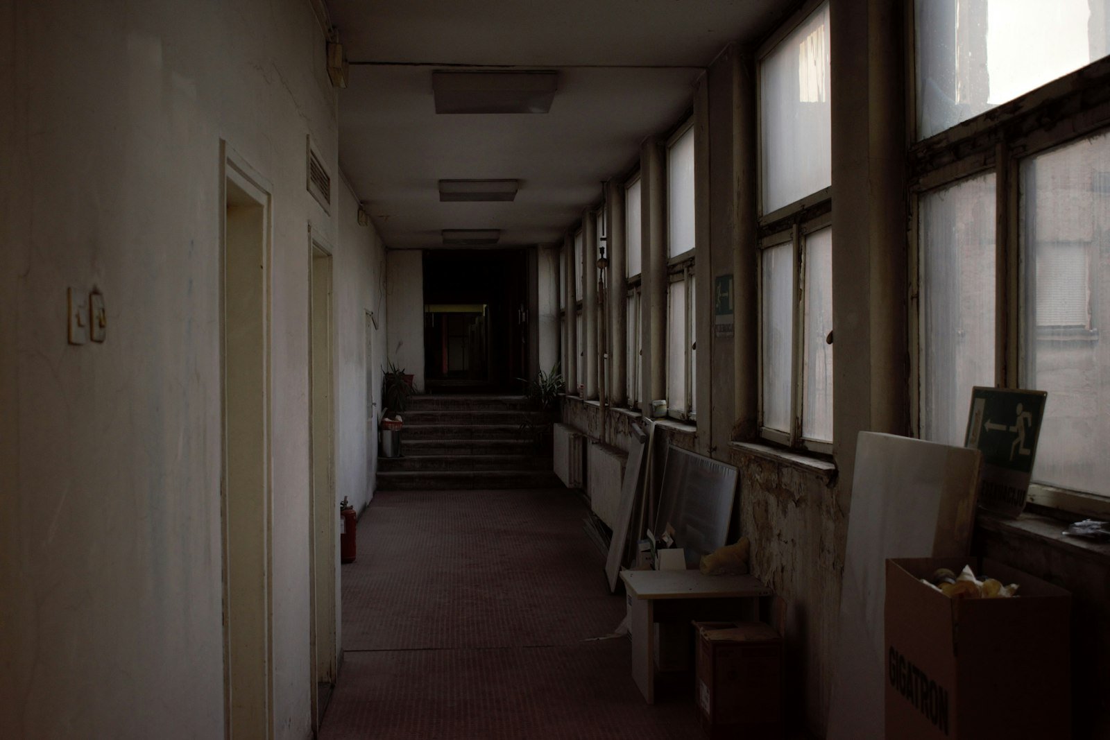 Maryland detention center abuse: long hallway of an old building lit by a row of windows
