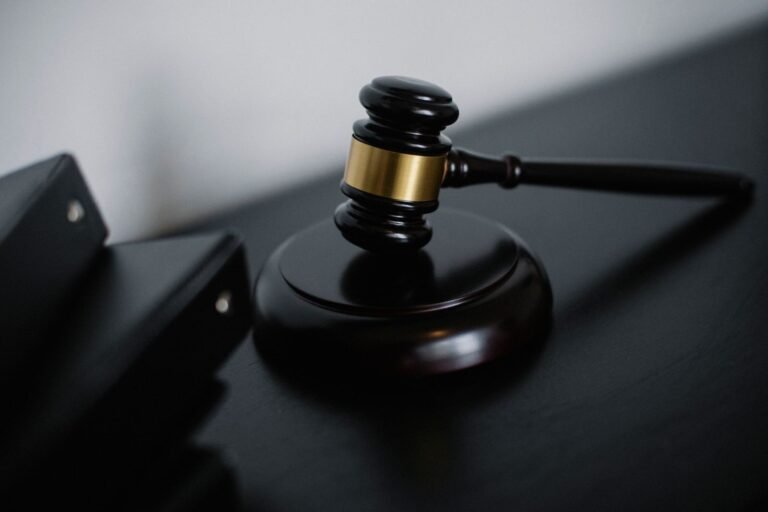 Bard PowerPort verdicts: close-up of a wooden judge's gavel resting on a desk