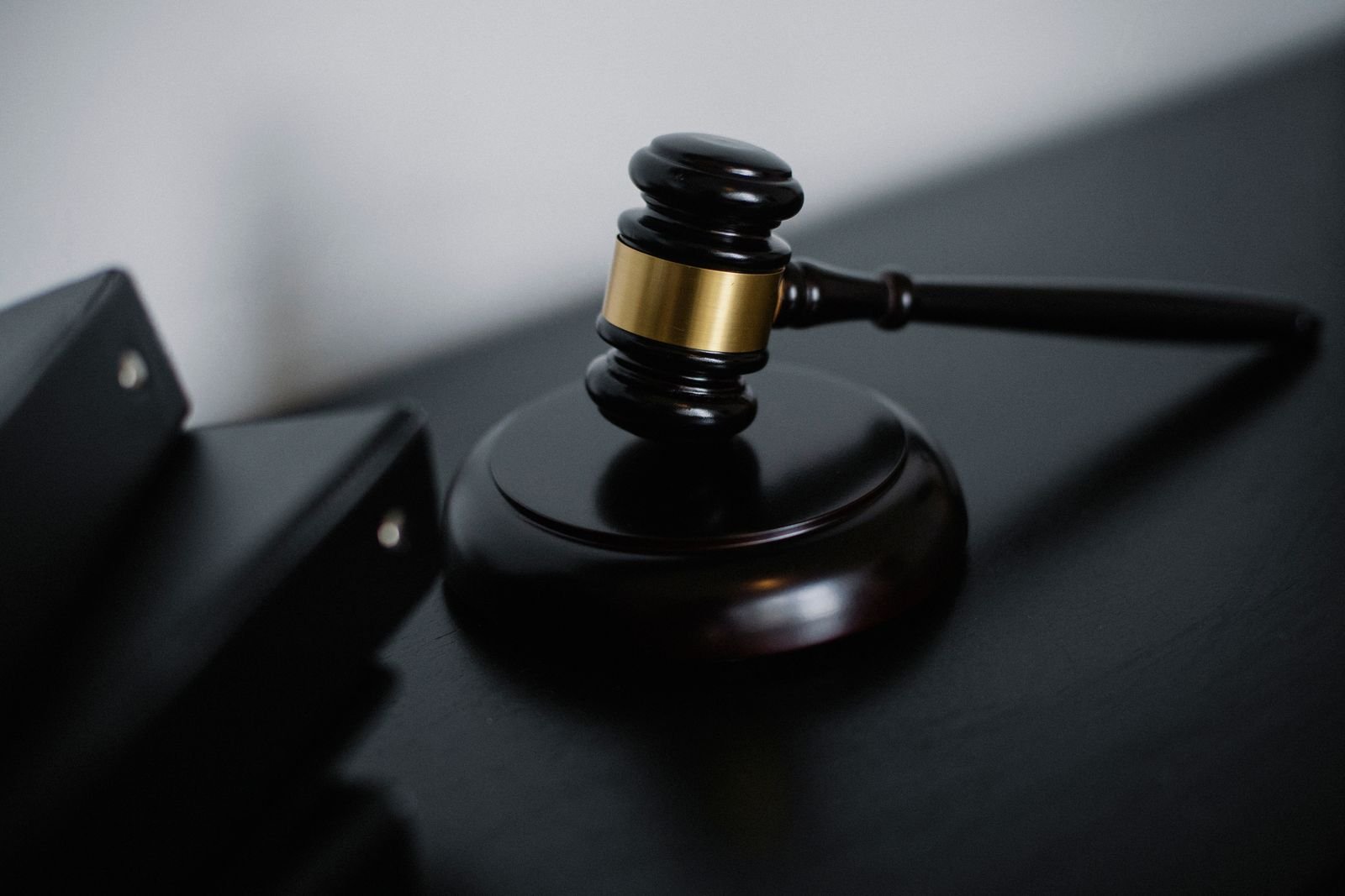 Bard PowerPort verdicts: close-up of a wooden judge's gavel resting on a desk