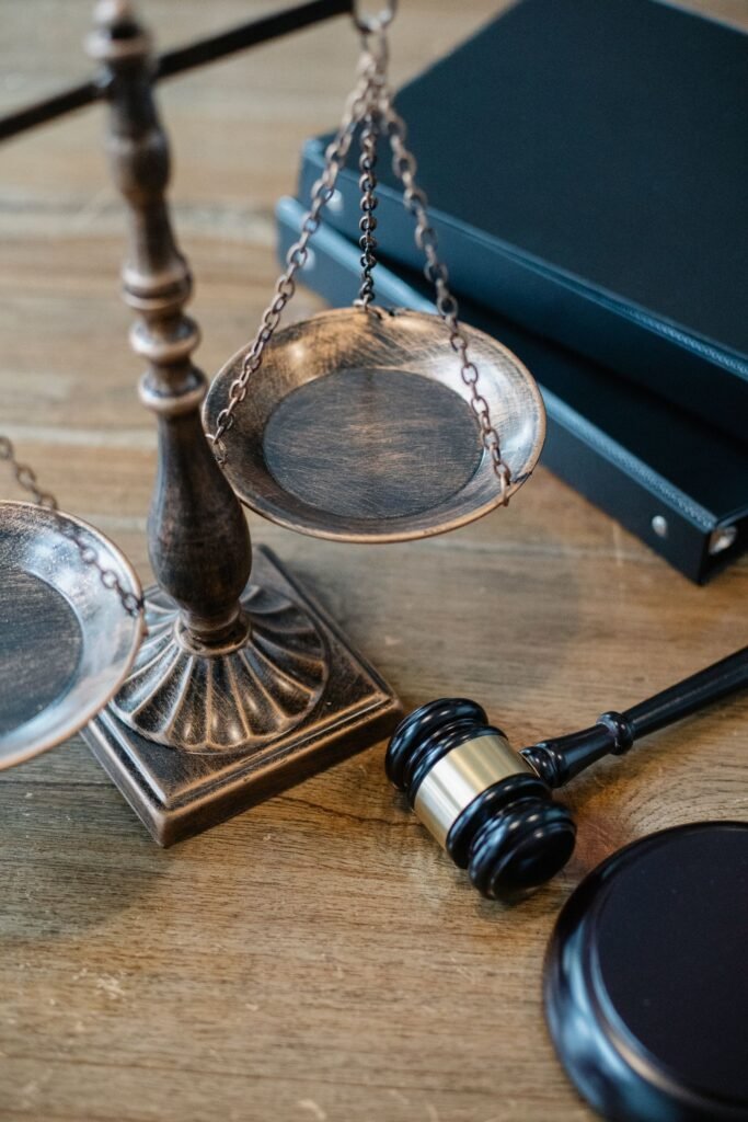 Bard PowerPort verdicts: brass scales of justice and a gavel on a wooden table