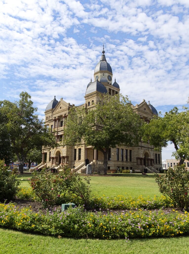 Uber and Lyft assault lawsuits: historic county courthouse surrounded by green trees