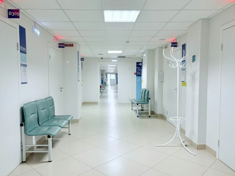 Northwell hidden camera lawsuit: empty hospital corridor with benches and closed doors