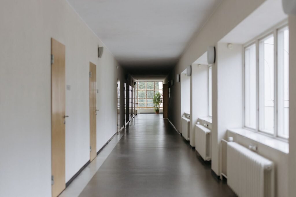 California sb 577: quiet empty corridor inside a school building