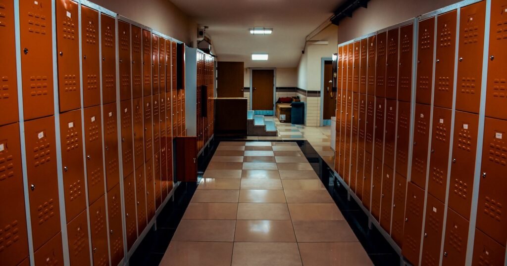 Empty school locker room and hallway