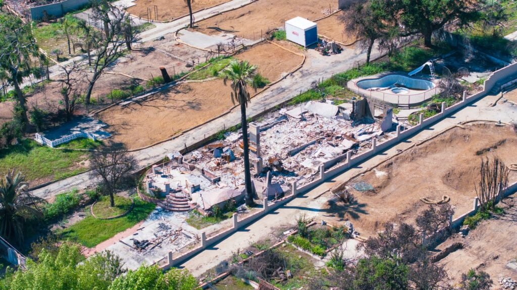 Aerial view of a home destroyed by wildfire in Altadena, a scene at the center of a California wildfire lawsuit