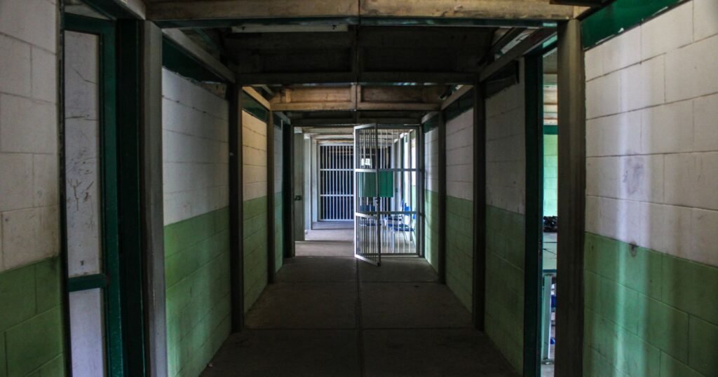 Empty institutional corridor representing CIW abuse lawsuit eligibility for former prisoners