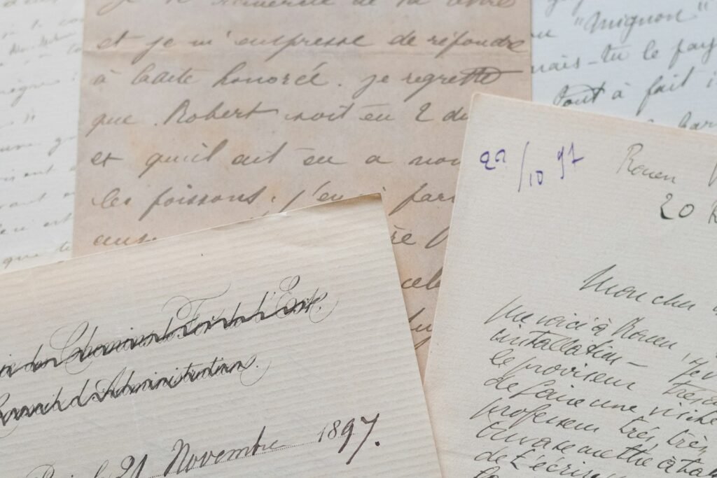 Old handwritten letters with faded ink, like notes and records survivors may keep