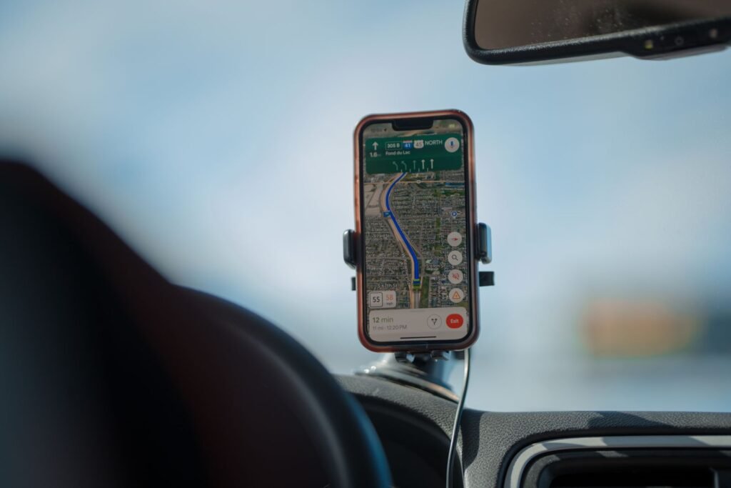 Smartphone with a navigation app on a car dashboard, a key record in rideshare driver injury claims