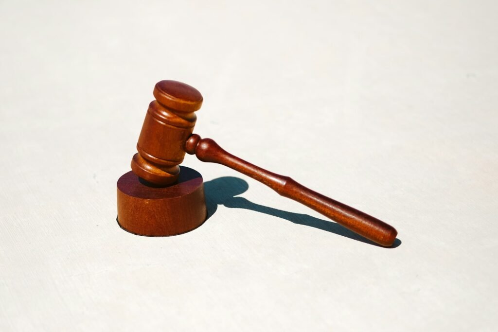 Wooden judge gavel on a white surface, representing the Dupixent lawsuit in federal court
