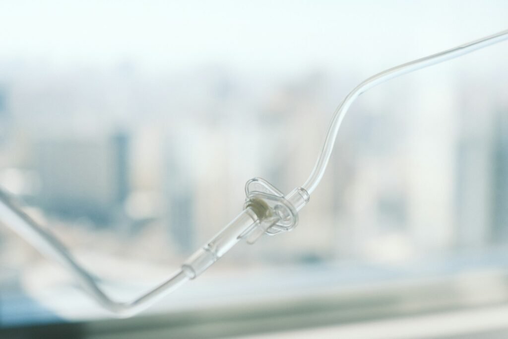 IV drip line in a hospital, a reminder to watch for implanted port warning signs during infusions