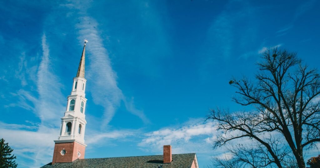 Church steeple against a blue sky