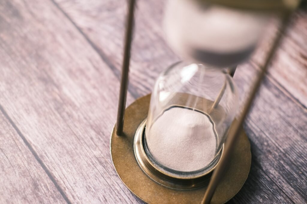 Hourglass on a wooden table, a reminder that the LDS abuse statute of limitations can run out over time