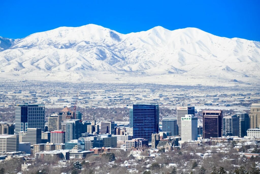 Salt Lake City skyline below the mountains, where many questions about an LDS Church abuse lawsuit begin