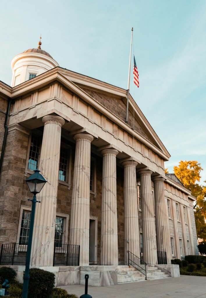 Baltimore County Courts Building in Towson, Maryland, with columns and a flag on top