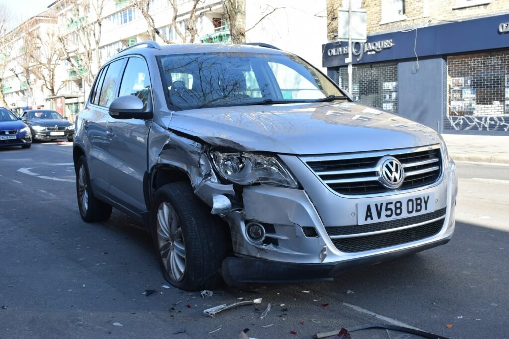 Car with front-end damage after a collision, the starting point for many motor vehicle accident compensation claims