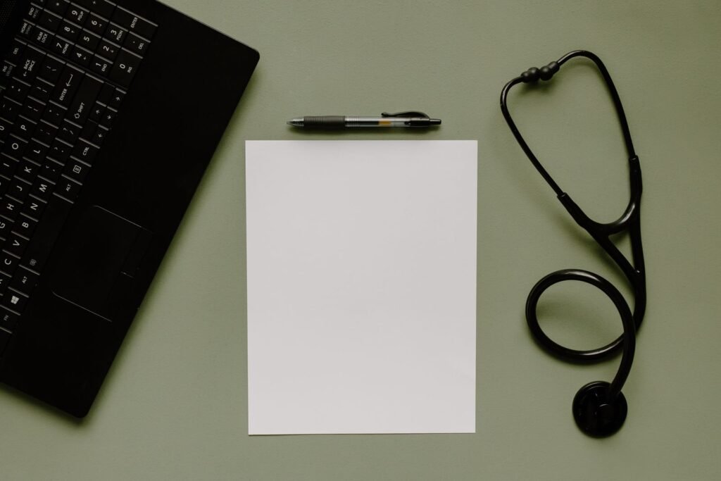 Stethoscope, pen and blank paper on a desk, illustrating medical records for an Ozempic gastroparesis lawsuit