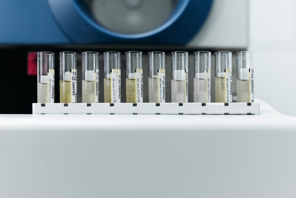 PFAS lawsuit: labeled test tubes in a lab rack, used for testing products for PFAS chemicals