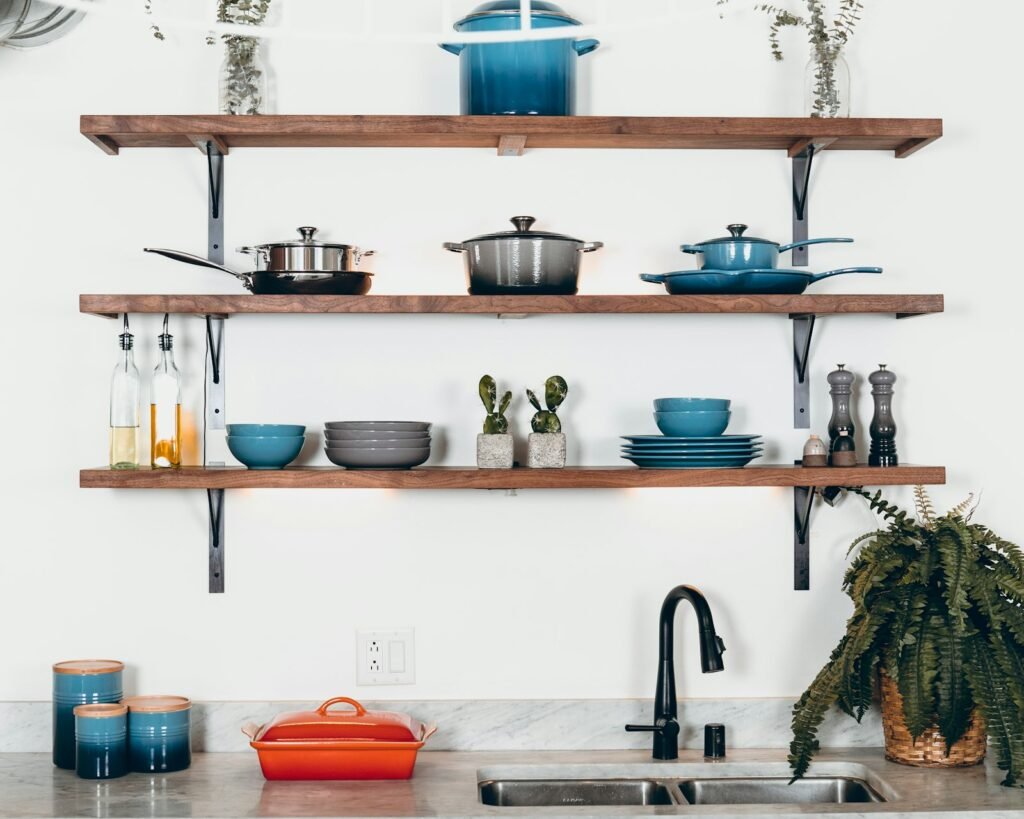 Cookware on kitchen shelves, the kind of nonstick products at issue in a consumer PFAS lawsuit