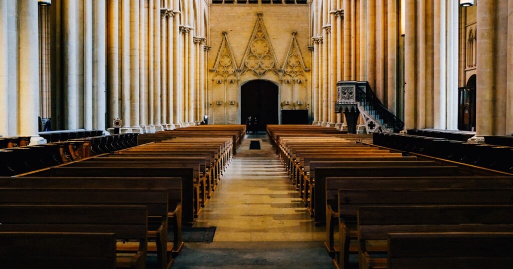 Empty church pews inside a cathedral