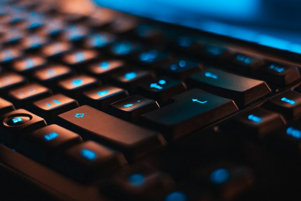 Close-up of a lit gaming keyboard, a reminder to set parental controls while Roblox lawsuits continue