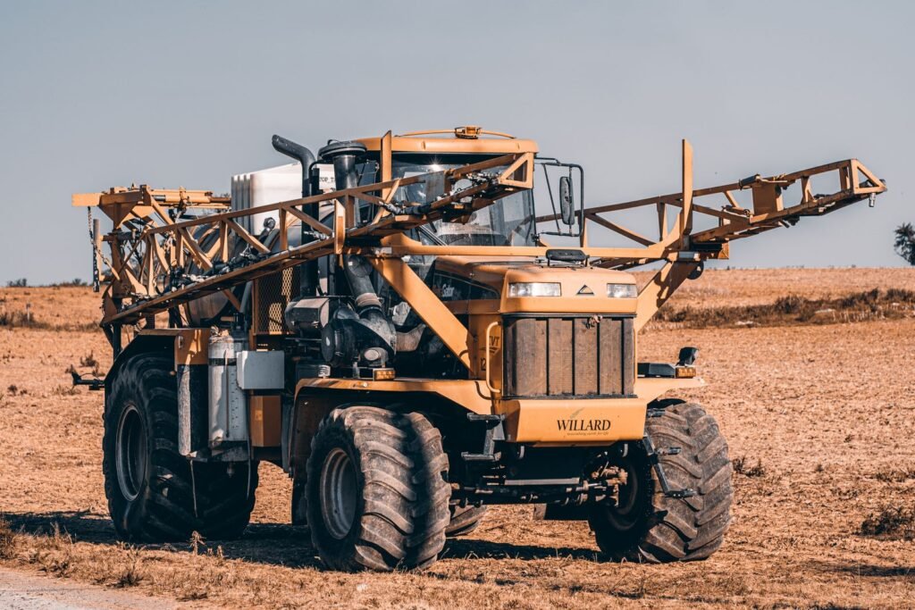 Self-propelled sprayer working a large farm field, the kind of herbicide use behind a Roundup cancer lawsuit
