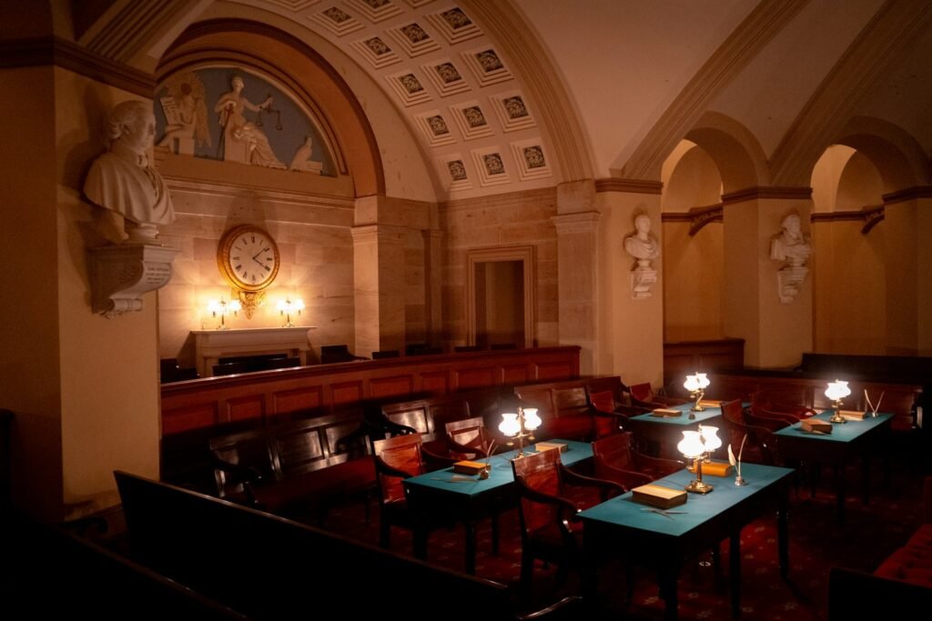 Historic courtroom with wooden benches and desks, the kind of setting where Roundup verdicts are decided