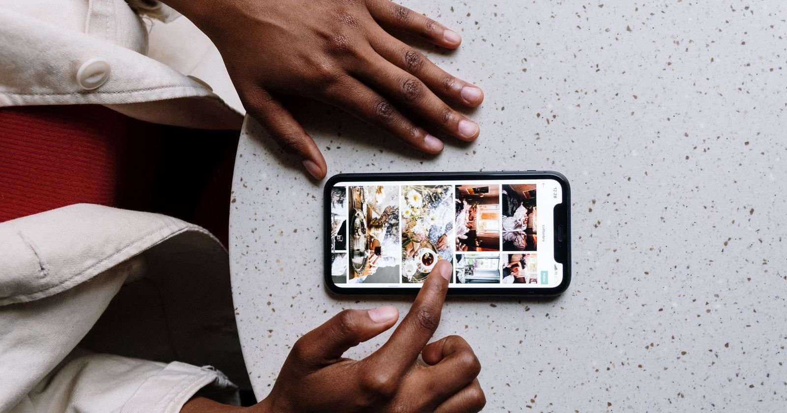 Parent and teen reviewing photos on a smartphone, illustrating social media lawsuit evidence