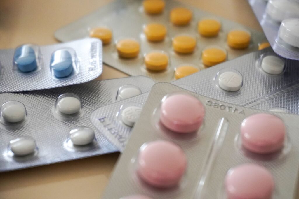 Close-up of medication blister packs, illustrating pain relievers taken during pregnancy