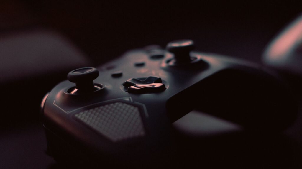 Close-up of a game controller in low light, illustrating video game addiction lawsuit status updates