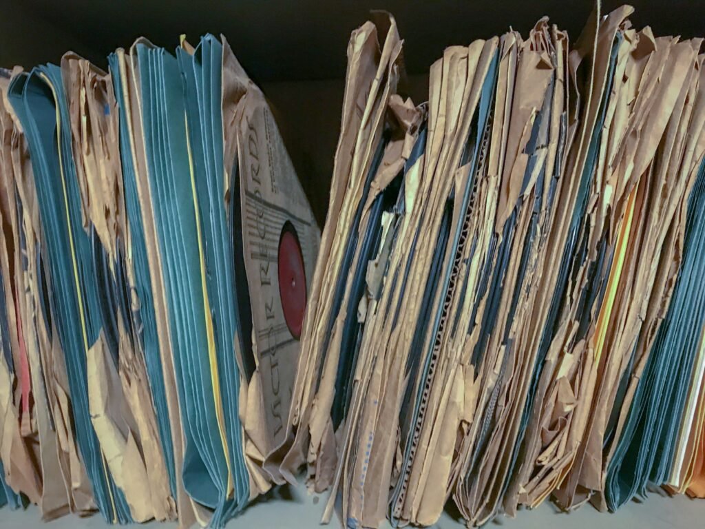 Stacked paper files on a shelf, like the Bard PowerPort claim documents patients gather from hospitals